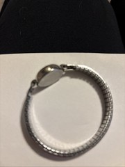 Vintage Ladies Wristwatch Silver Toned Metal Stretch Bracelet With Oval Face 10k