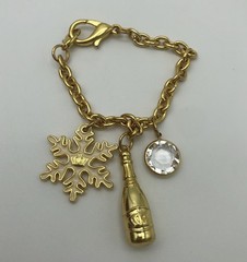 Vintage Juicy Couture Gold Tone Snowflake Champagne Bottle Bag Charm Bracelet
