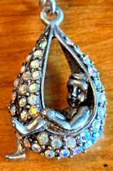 Rare Kirks Folly “Stork and Baby” Brooch Gunmetal AB Crystal Opalite Vintage