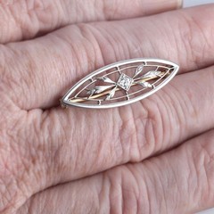Antique Edwardian platinum Old European diamond brooch/lapel pin. By Krementz.