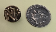 B.A. Ballou & Co., indicated by the “BALLOU REG’D” Letter “N” lapel pin VINTAGE