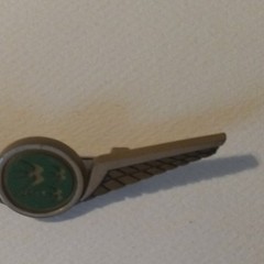 Stoffel Seals Signed Wing Brooch Pin Gold Tone Green Round Bezel Center