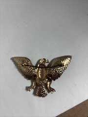 Vintage eagle brooch 1.5 Inches X 2 Inches Gold Colored With Red White And Blue