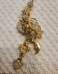 Vintage Kirk’s Folly Goldtone And Rhinestone Cherub Dangle Pendant Necklace.
