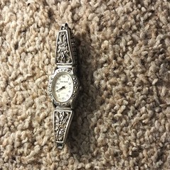 lot of pin, belt buckel and watches