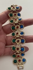 Vintage Gold Tone multi-gemstone link bracelet with a fold-over clasp 7’ in