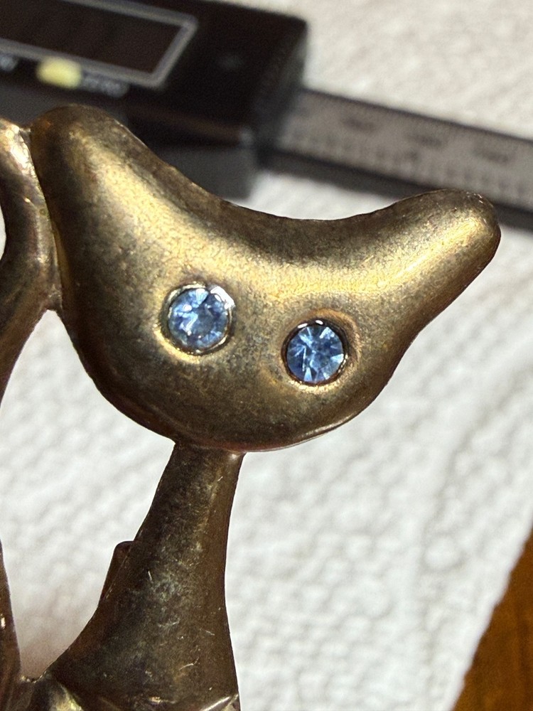 Vintage cat brooch c clasp pin blue rhinestone eyes stamped brass stylized