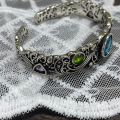 Openwork carved blue topaz bracelet for women, vintage style.