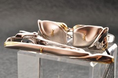 Near mint, gold and Cufflinks and silver tie clip, “Yves Saint Laurent”, case.