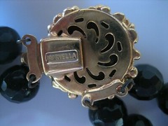 VINTAGE SIGNED MARVELLA BLACK FACETED BEAD WITH FANCY GOLD TONE CLASP NECKLACE