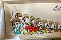 MCM “LIttle Miss Jewels” Chinatown LA Panel Bracelet. New / Still in box
