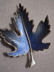 Maple leaf figural brooch, silvertone finish, blue ombre design