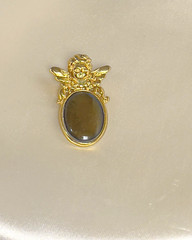 Vintage 1990s Gold Tone Angel Pendant with Deep Green Cabochon – 1.25 x 0.9 Inch