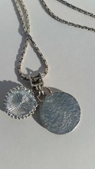 Blue Tiger Eye Cabochon style pendant with a convex formed silver toned reverse