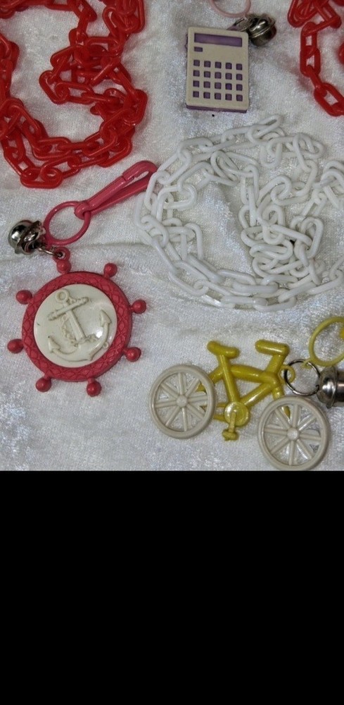 vintage lot of 8- 80s bell charms and necklaces calculator bike, anchor