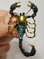 Vintage-Inspired Gold Scorpion Brooch with Teal Rhinestones