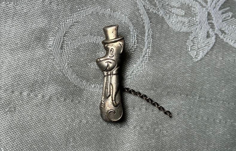 Vintage Huckleberry Hound pin, silver color, has chain attached REDUCED PRICE