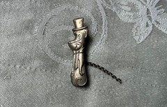 Vintage Huckleberry Hound pin, silver color, has chain attached REDUCED PRICE