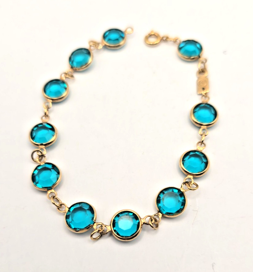 Vintage Swarovski gold-tone bezel-link bracelet Aqua blue Crystals 8″ Swan mark