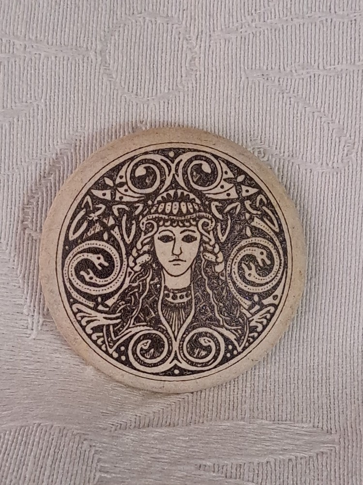 Vtg Beige Ceramic Celtic Goddess of Healing Fire & Inspiration Round Shape