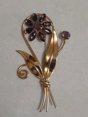 Sterling silver gold plated prong set purple glass flower & stem leaf brooch