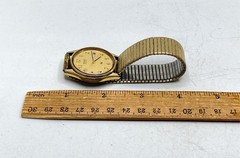 Vintage Seiko 5H23-7879 Gold Tone Quartz Watch Day Date Expansion Band 34mm