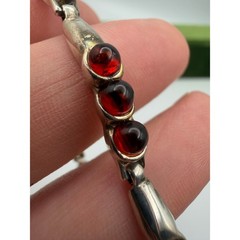 sterling silver tennis-style link chain bracelet cabochon-cut red Baltic amber