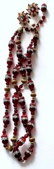 MIRIAM HASKELL 40′ HORSESHOE 2-PC BLOOD RED CÔTELÉ & NUGGET BEAD ICE R/S ACCENTS