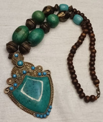 Vintage brass metal necklace with green stone made of brass and faux wood beads
