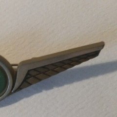 Stoffel Seals Signed Wing Brooch Pin Gold Tone Green Round Bezel Center