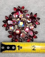 Vintage gold-toned Brooch featuring Ruby Red Navette and round Aurora Borealis