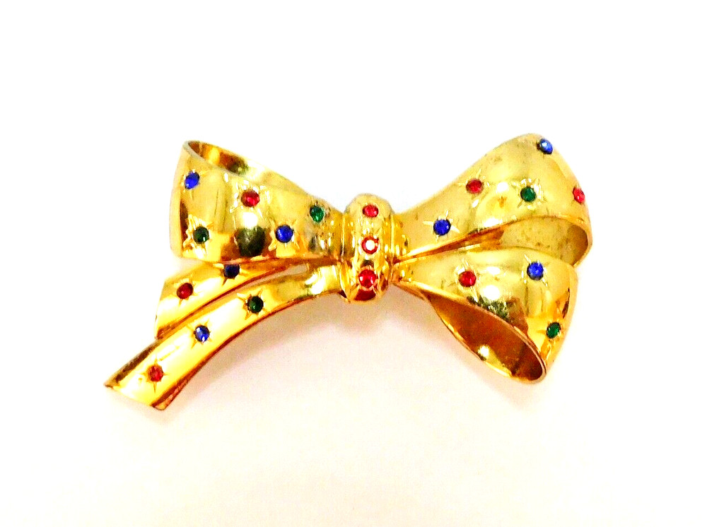 Vintage Signed CORO Bow Brooch Flush Set Jewel Tone Rhinestones Gold Plated Pin