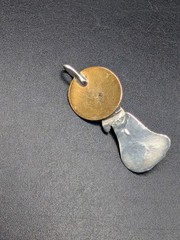 Small Southwestern Style Vintage Wolf Howling at The Moon Pendant