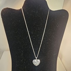 Vintage Sparkling Silver Toned Avon heart pendant with rhinestones