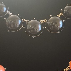 2 Statement Necklaces each 18″-20″ one Black and one Orange.