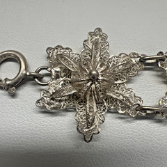 Antique Silver Bracelet featuring Finely detailed Filigree Flowers