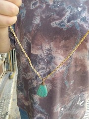 A braided red copper necklace a medium-sized, rare pear-shaped pure turquois