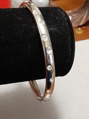 Crystal polka dot bangle bracelet Silvertone flush set stones eternity band