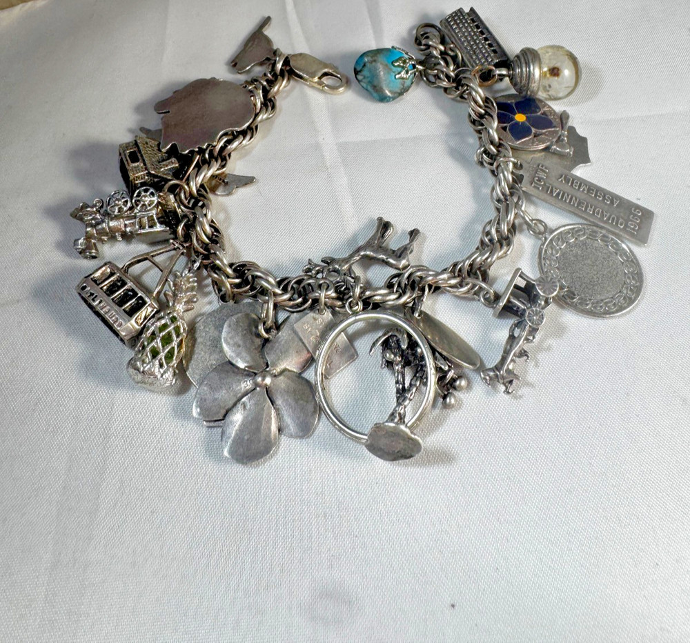 Sterling Silver Bell Trading Vintage link charm bracelet with 25 various charms