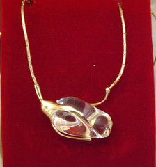 Steuben glass rose bud mounted with a 14kt yellow gold 17″ neck chain
