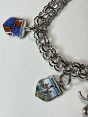 Vintage travel bracelet Sterling with charms popular between 1950 and 1970,