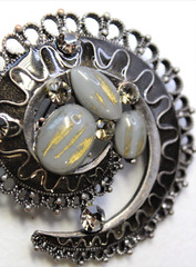 Vintage Gray Rhinestone Metal Swirl Cabochon Brooch Pin