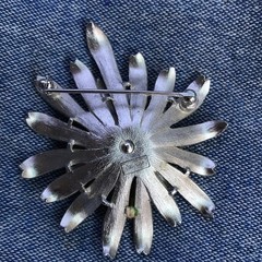 TRIFARI Brooch Pin Flower Floral Burst signed – silvertone relief 2.25″ diameter