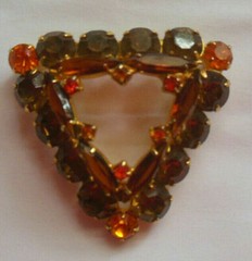 Triangular Shape Brooch with multi color faceted prong-set stones