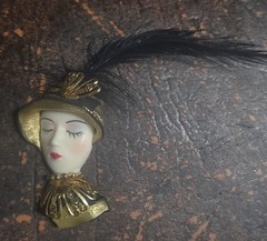 Beautiful Lady Head Brooch Porcelain looking skin black gold guild with feather
