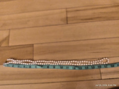 Marvella Vintage Luminous Faux Pearl Knotted Long Single Strand Necklace