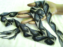 vintage 56-inch necklace or belt, beaded in blue, white, black wave pattern