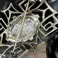 Dodds 11 W 30 St Inc mid cent mod foiled art glass geometric brooch