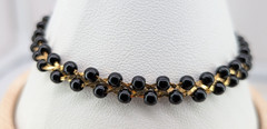 Vintage Trifari TM Bracelet Gold Tone Black Seed Bead Braided Link 7.5in Signed