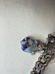Vintage travel bracelet Sterling with charms popular between 1950 and 1970,